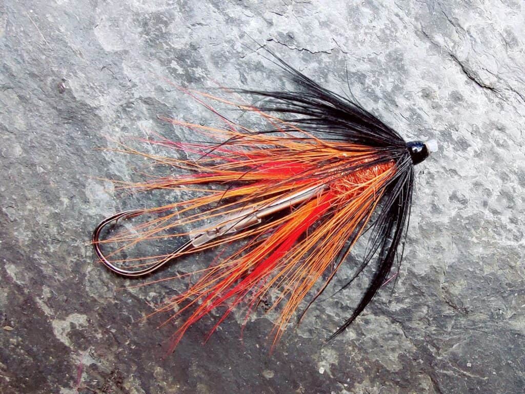 Black and Orange Mini Intruder Tube Fly