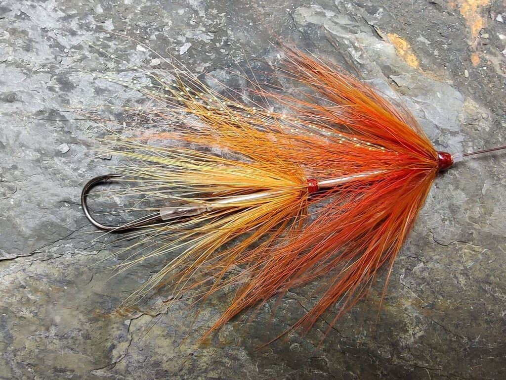 Brown and Orange Intruder Tube Fly